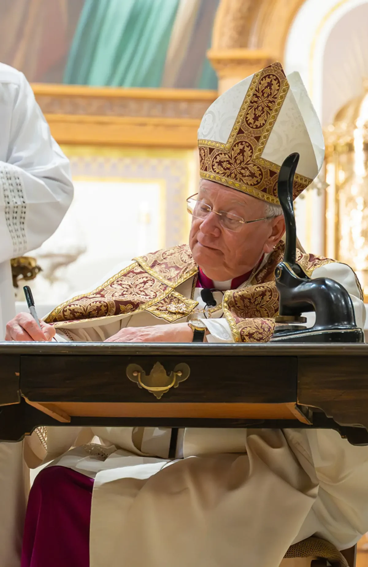 Bishop Ricken Signing Decree, declaring Adele Brice Servant of God